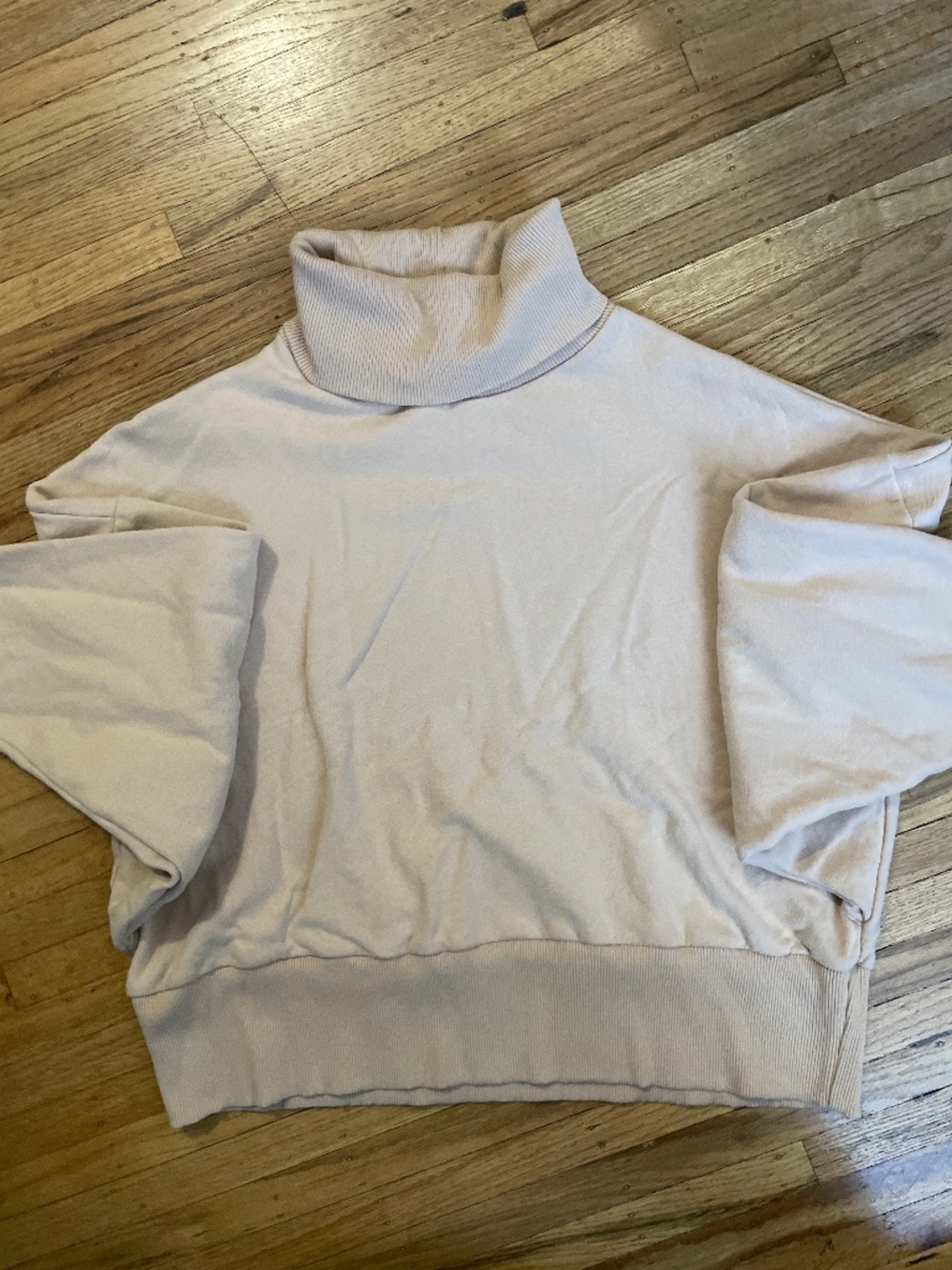 Beige turtleneck sweater